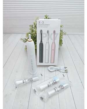 Электронная зубная щётка Три насадки, пять режимов переключения.